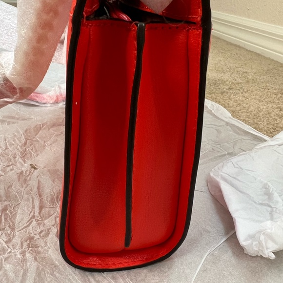 MICHAEL KORS
MOTT
35SOGOXC7L
LG CLUTCH XBODY
LEATHER
MANDARIN - Picture 6 of 11